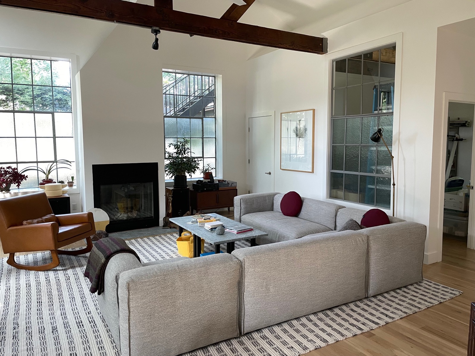 The living room with fireplace and seating
